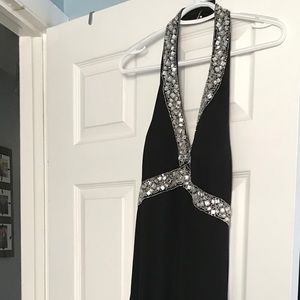 Black gown with sequence trim. Size 10